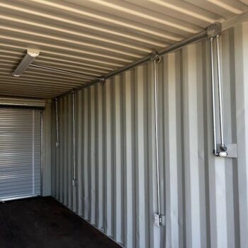 20-foot shipping container with roll-up door and electrical for sale in Huntsville, Alabama