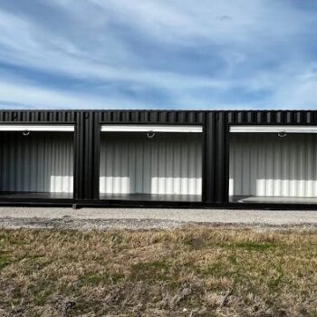 Black 40-foot shipping container with three roll-up doors for sale in Huntsville, Alabama